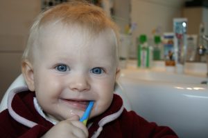 child brushing teeth at home